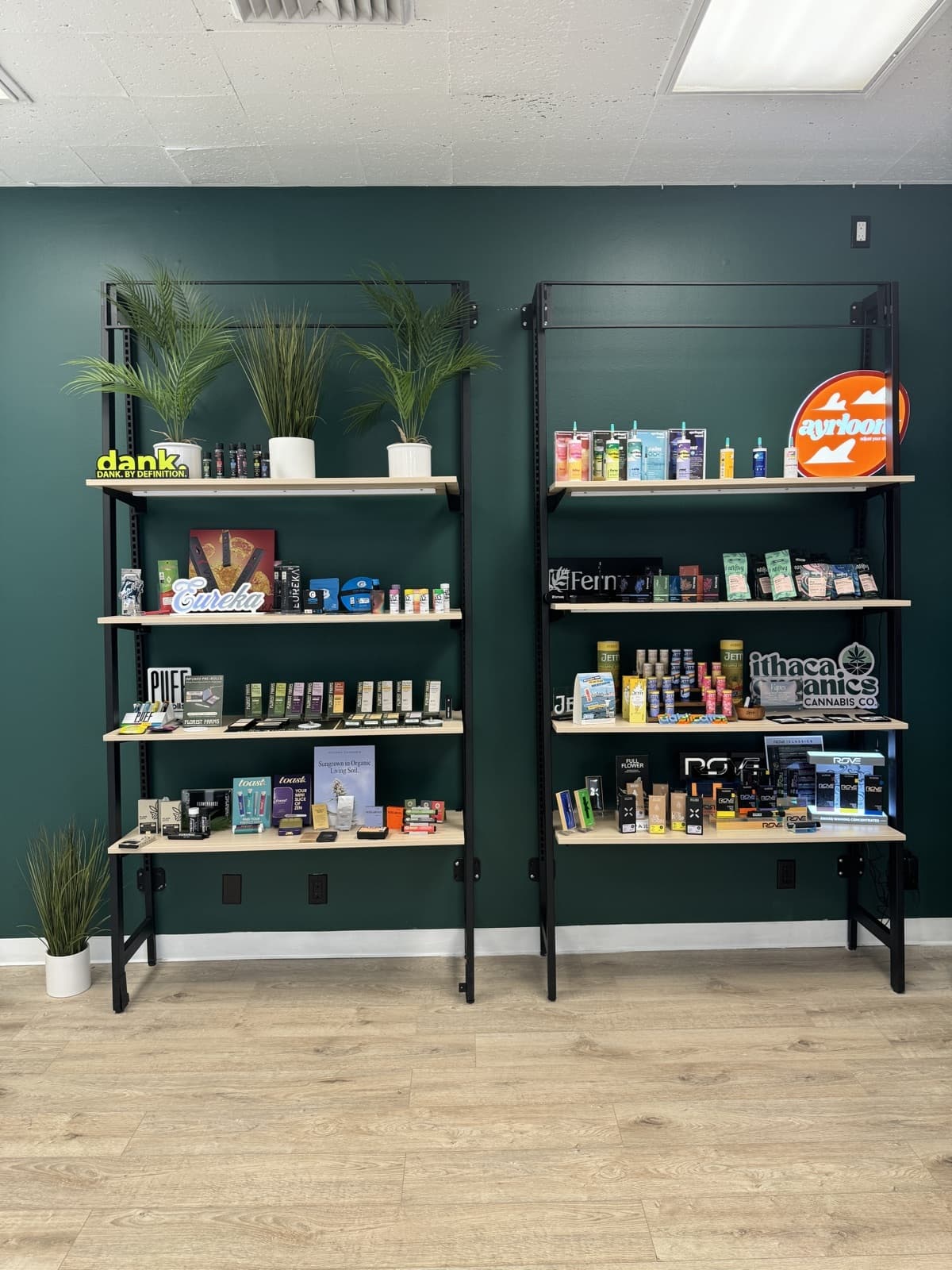 Upright retail shelves at Leafology with packaged cannabis products and brand displays
