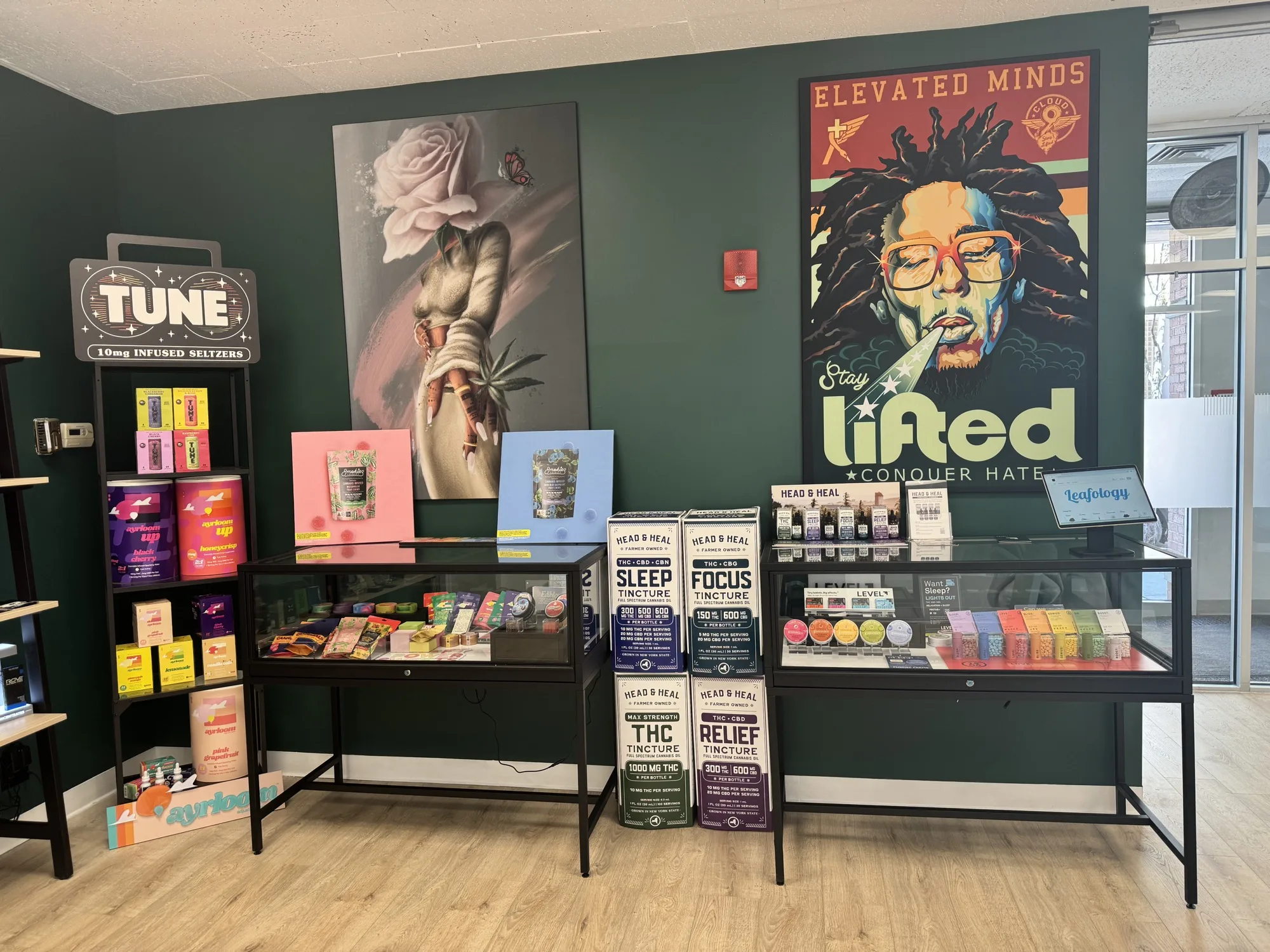 Leafology TUNE seltzer tower, Hear & Heal tinctures, and Elevated Minds wellness display